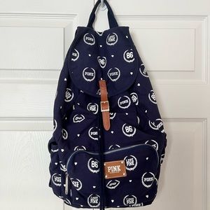 Pink Victoria’s Secret Blue book-bag.